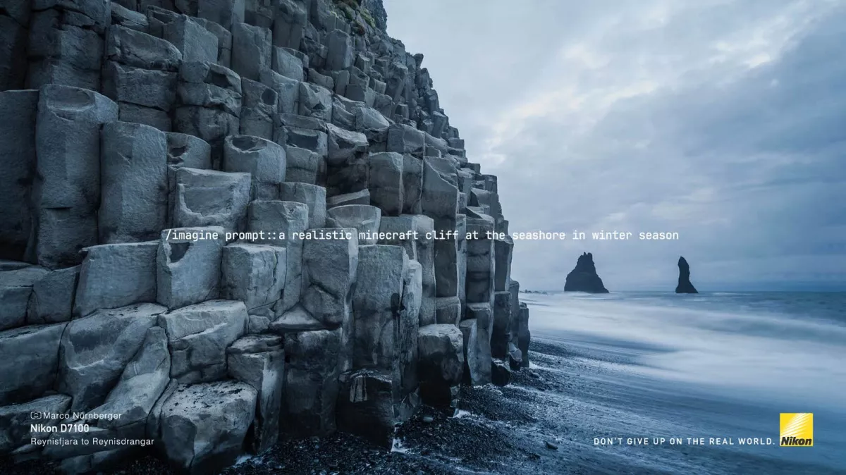 A rocky cliff on a beach

Description automatically generated
